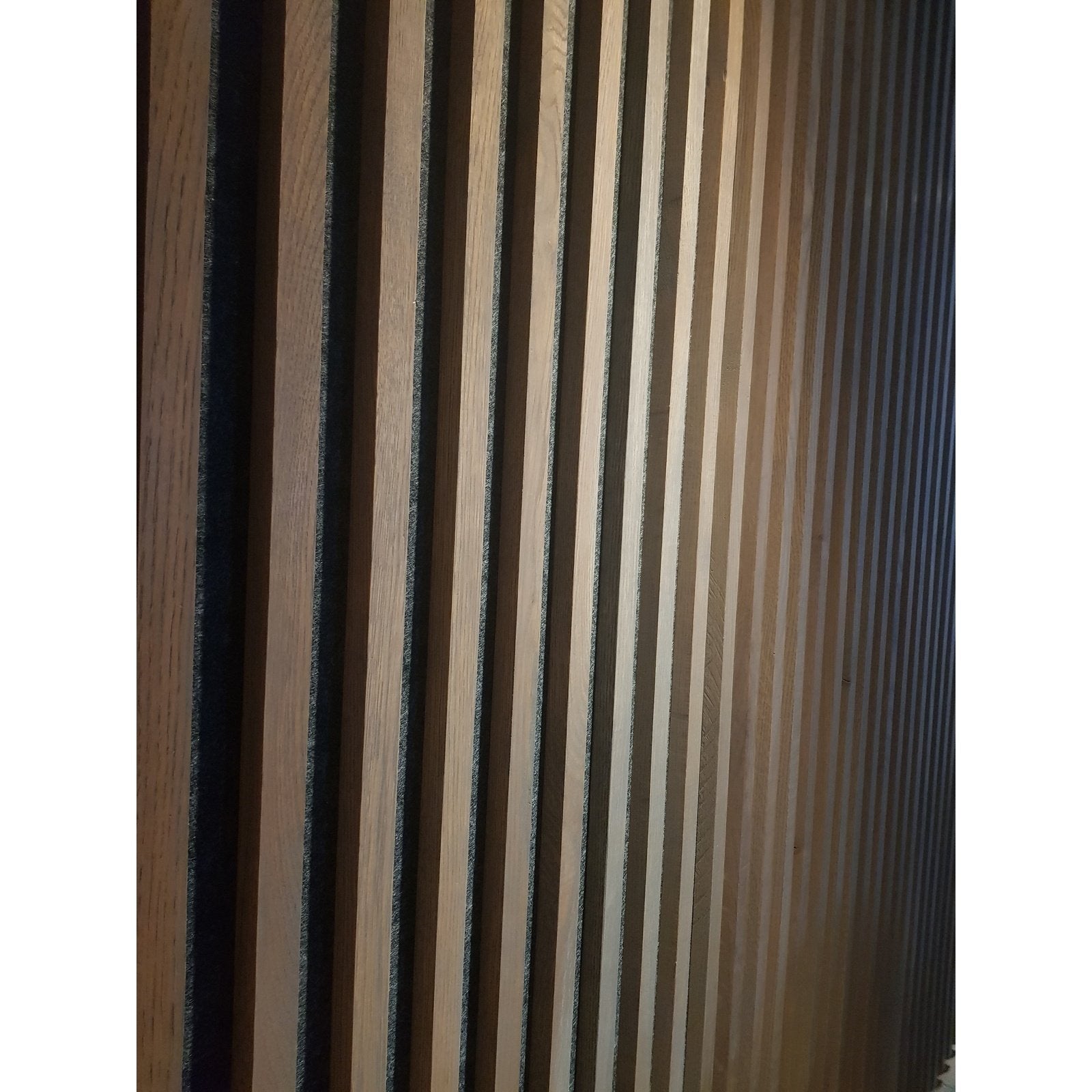 Oak slat wall panel with grey stain