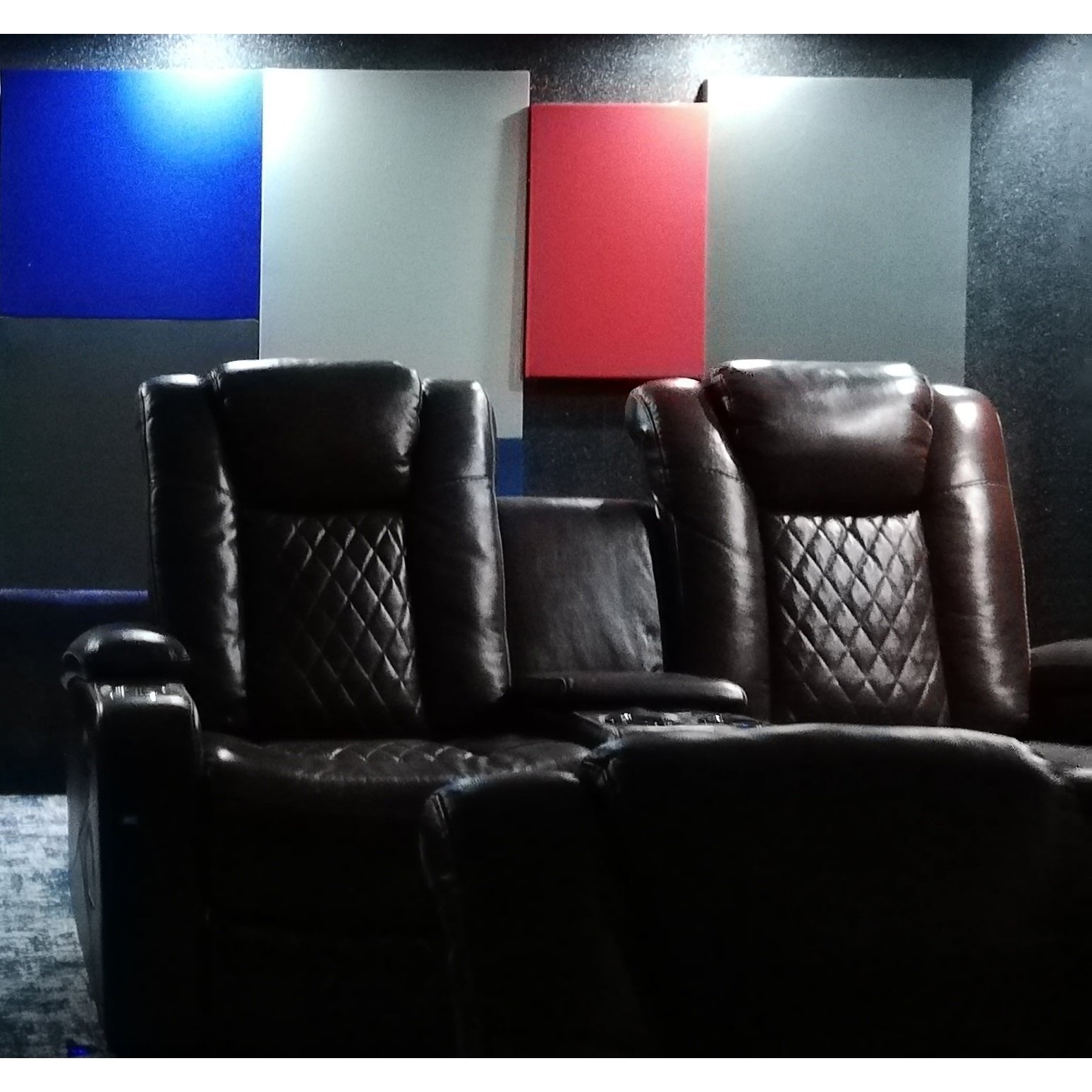 Home cinema installation with acoustic wall panels